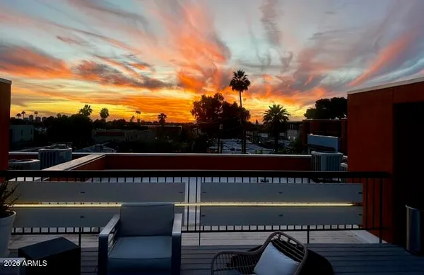 a view of a building with a street