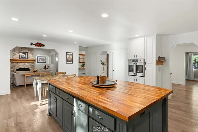 a kitchen with counter space and breakfast area