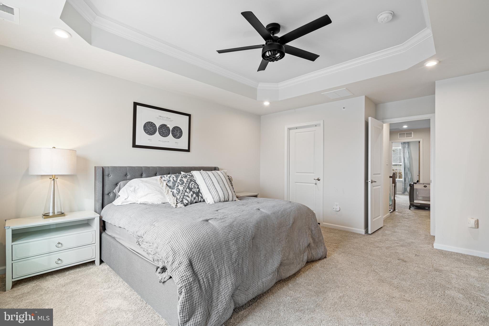 120 Bishop Way Dublin, PA 18917 - Photo 15 of 31 a spacious bedroom with a bed and a painting on the wall