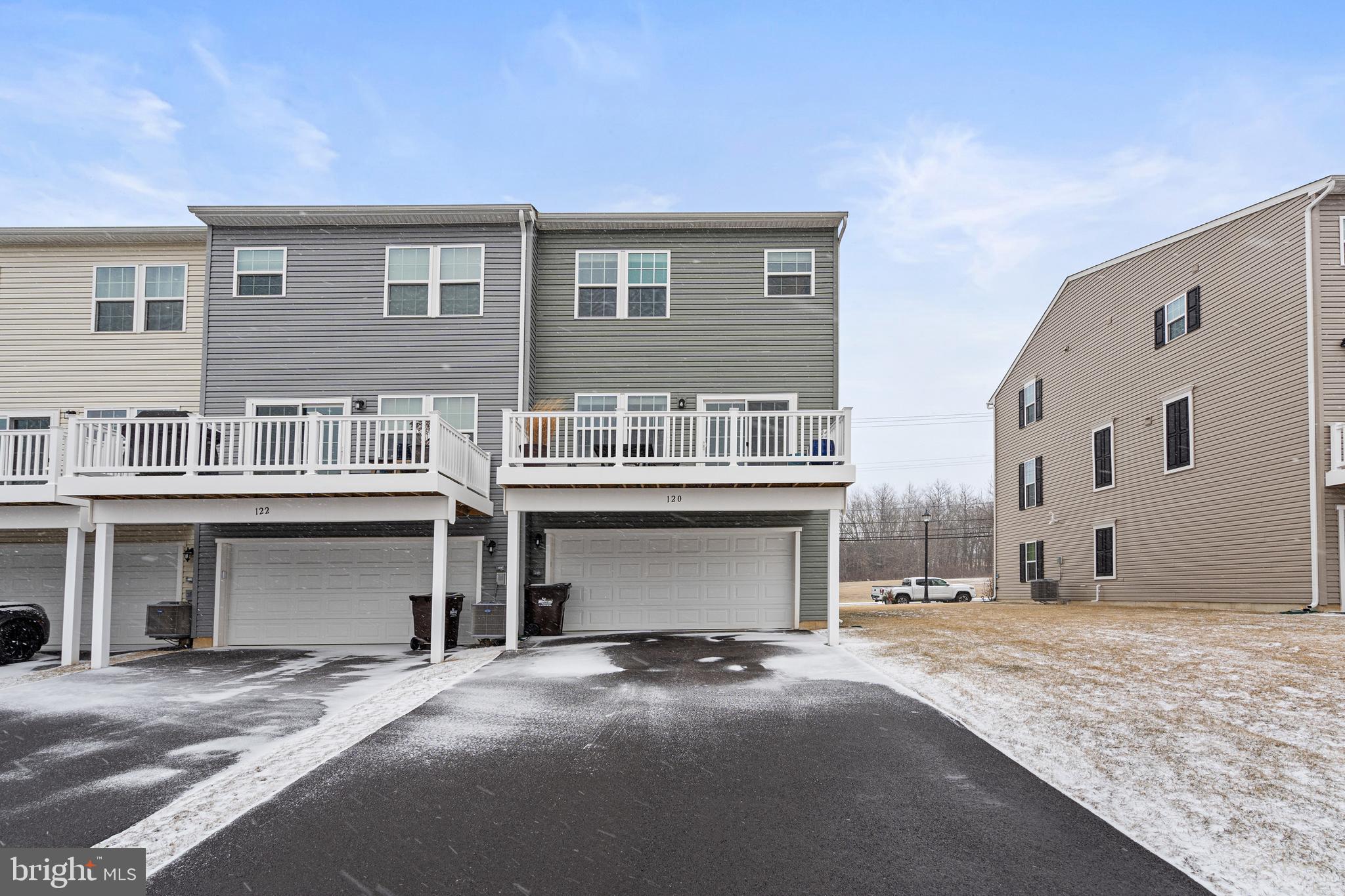 120 Bishop Way Dublin, PA 18917 - Photo 27 of 31 a front view of a house with a yard and garage