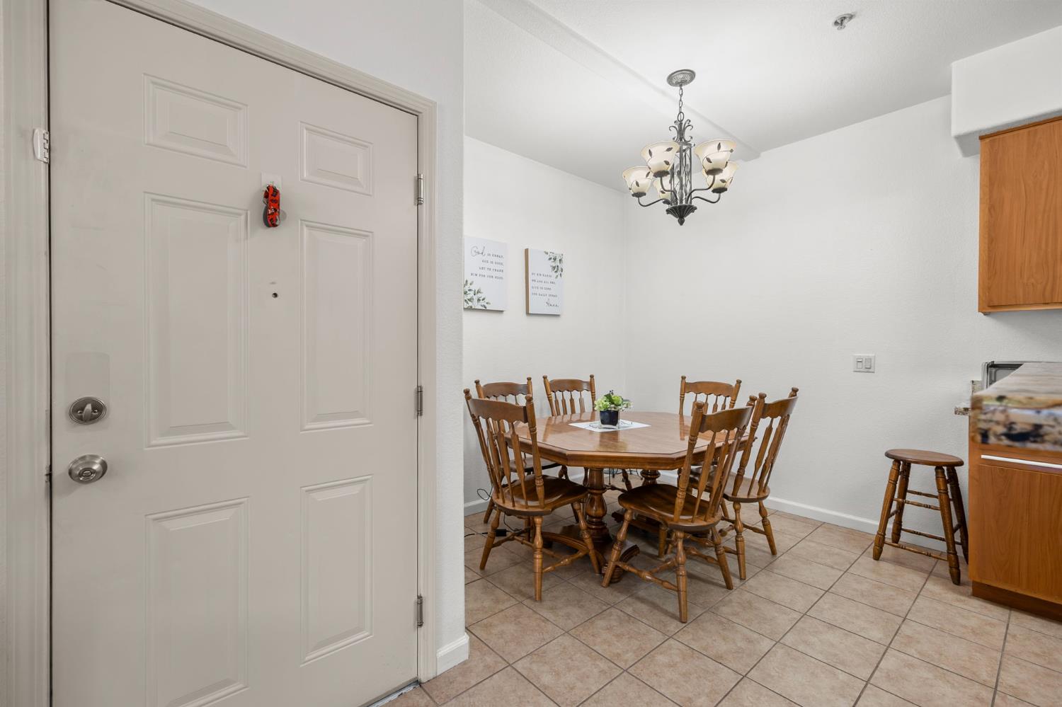 1251 Whitney Ranch Parkway, Unit 1212 Rocklin, CA 95765 - Photo 11 of 30 a view of a dining room with furniture