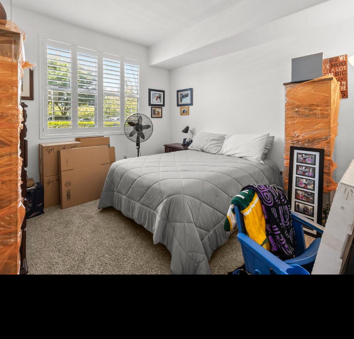 1251 Whitney Ranch Parkway, Unit 1212 Rocklin, CA 95765 - Photo 19 of 30 a bedroom with a bed painting on wall and a large window