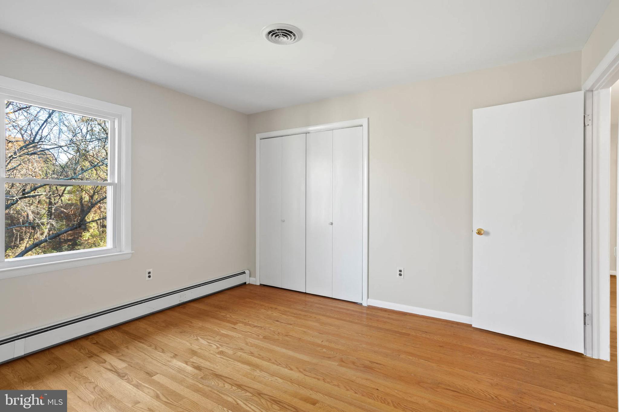 2123 Woodview Road Finksburg, MD 21048 - Photo 15 of 28 Main level bedroom 2 w/ hardwood floors