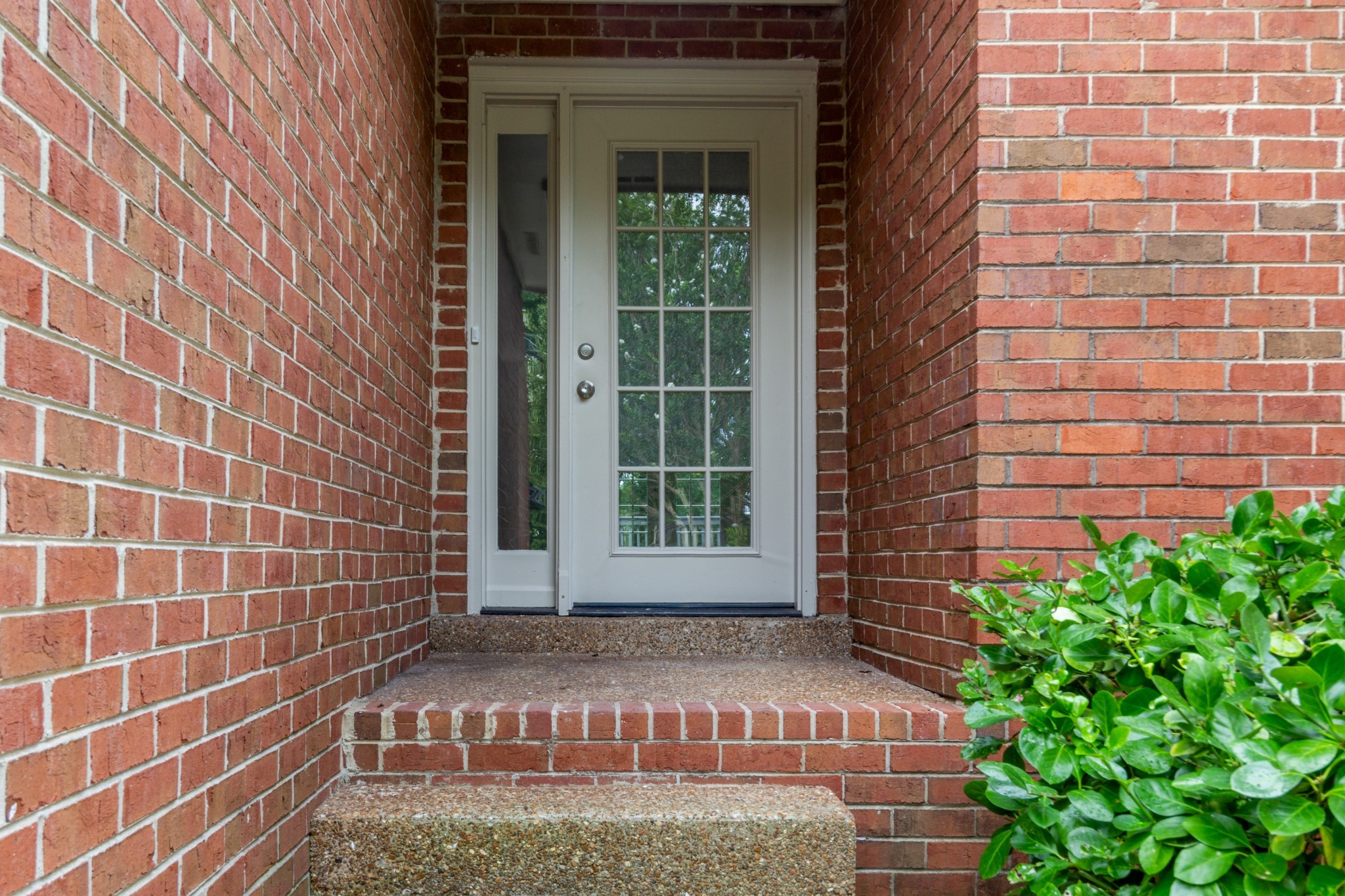 2315 Rader Ridge Road Antioch, TN 37013 - Photo 4 of 29 a view of a brick house with windows
