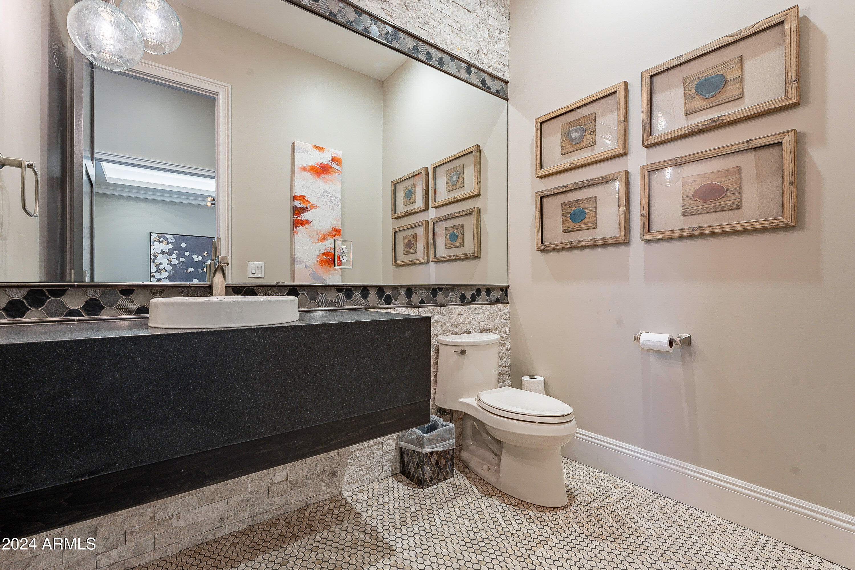 2911 East Morrison Ranch Parkway Gilbert, AZ 85296 - Photo 75 of 117 a bathroom with a sink vanity mirror and toilet