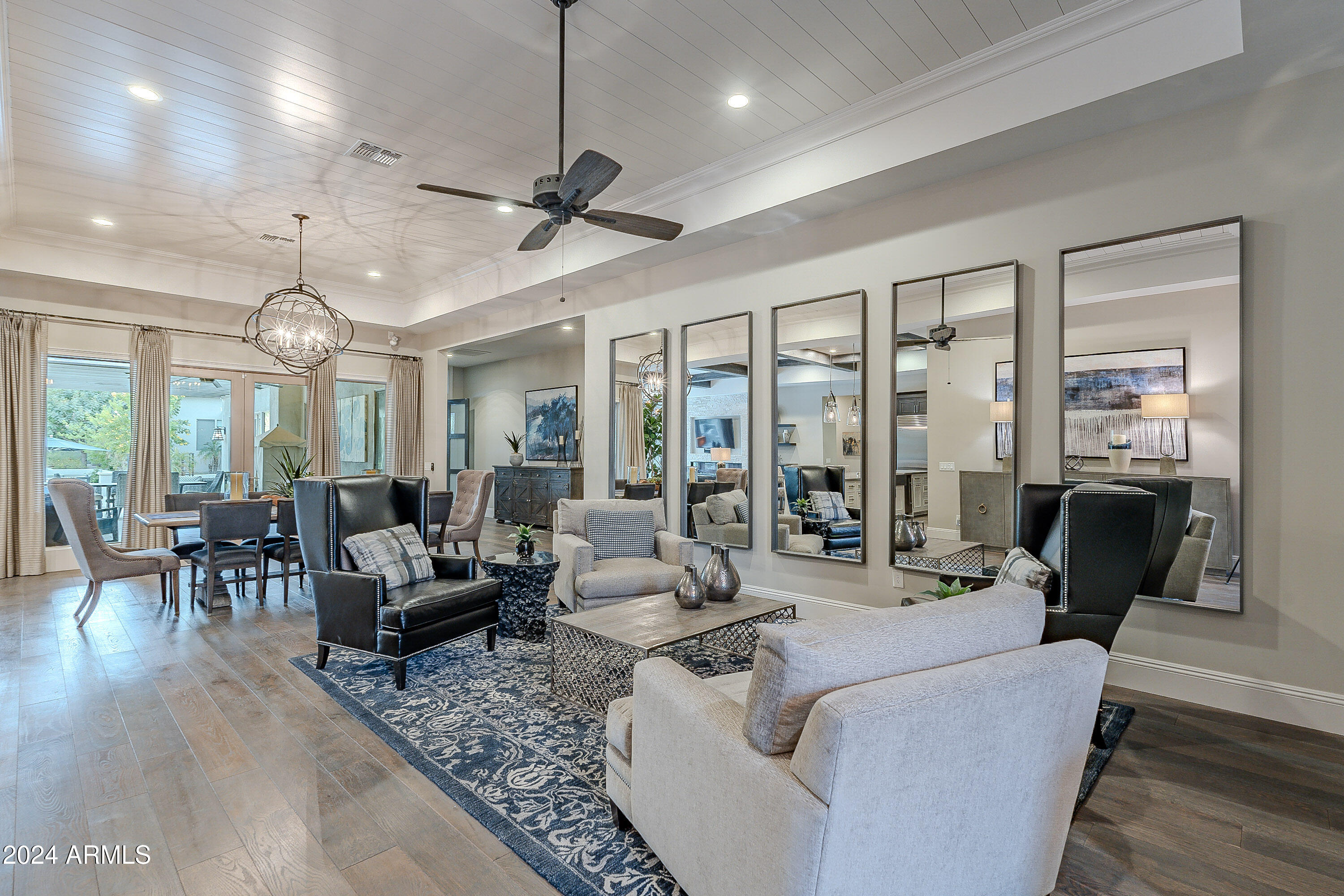 2911 East Morrison Ranch Parkway Gilbert, AZ 85296 - Photo 9 of 117 a living room with furniture dining area and a large window