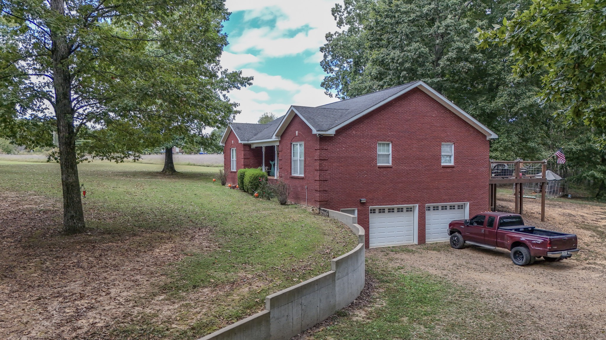 979 State Line Road Five Points, TN 38457 - Photo 8 of 23 a view of a house with a yard