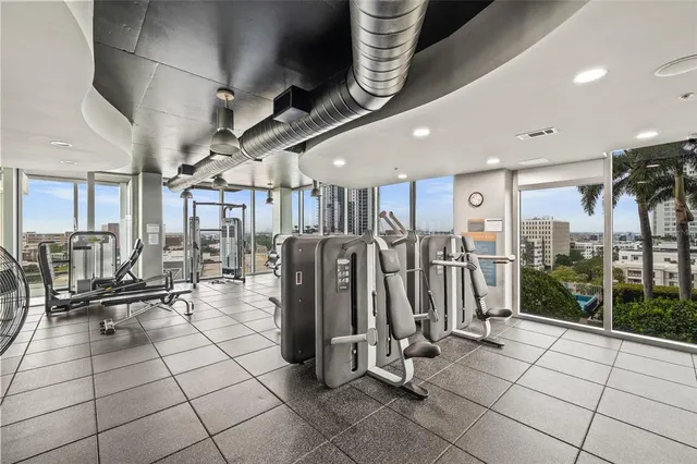 a living room with furniture and flat screen tv