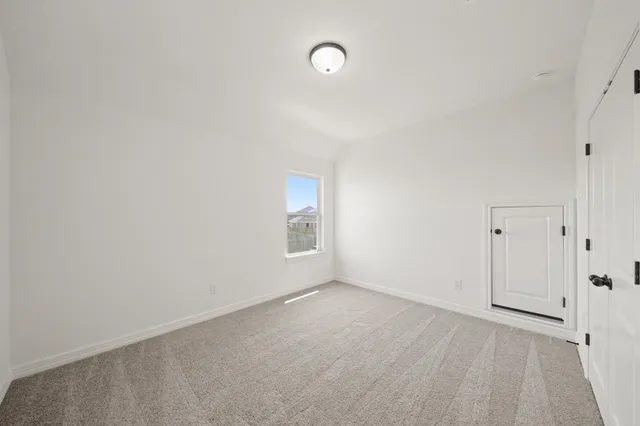 a view of room and hardwood floor