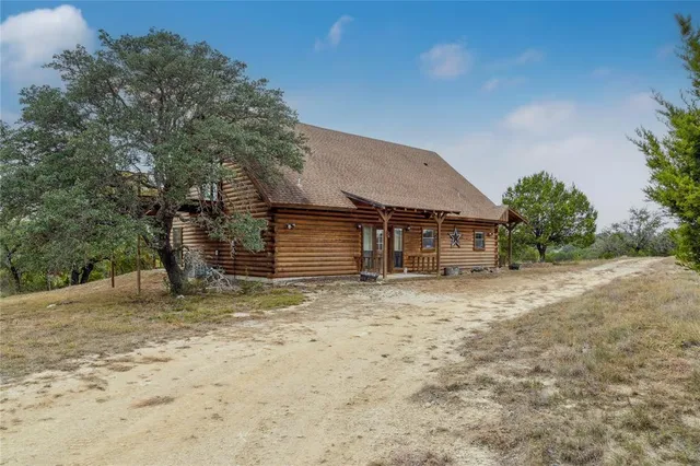 a lobby with furniture and next to a window