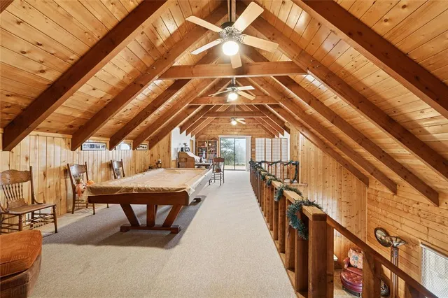 a view of a patio with a table and chairs