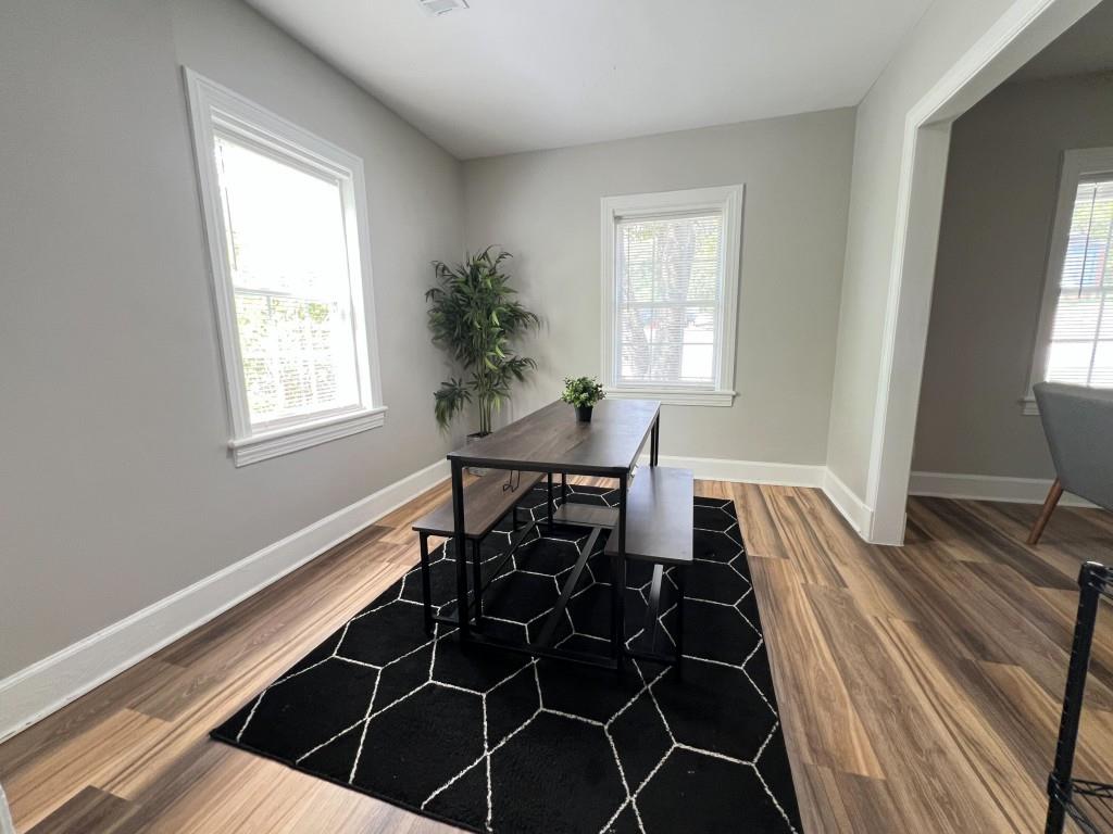 1076 Carlisle Avenue Macon, GA 31204 - Photo 2 of 16 a living room with a table chair and a window