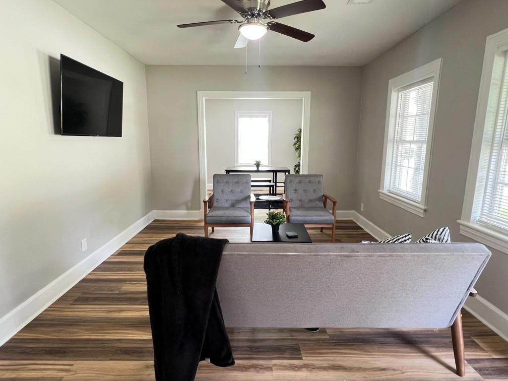 1076 Carlisle Avenue Macon, GA 31204 - Photo 6 of 16 a living room with furniture and a flat screen tv
