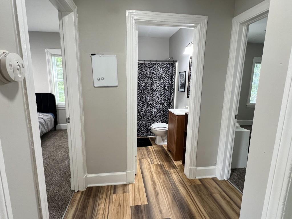 1076 Carlisle Avenue Macon, GA 31204 - Photo 10 of 16 a view of a bedroom from a hallway
