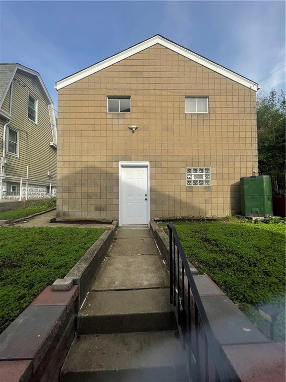 956 Beaver Road Ambridge, PA 15003 - Photo 5 of 44 back of garage, entrance to lower level 20x22 room