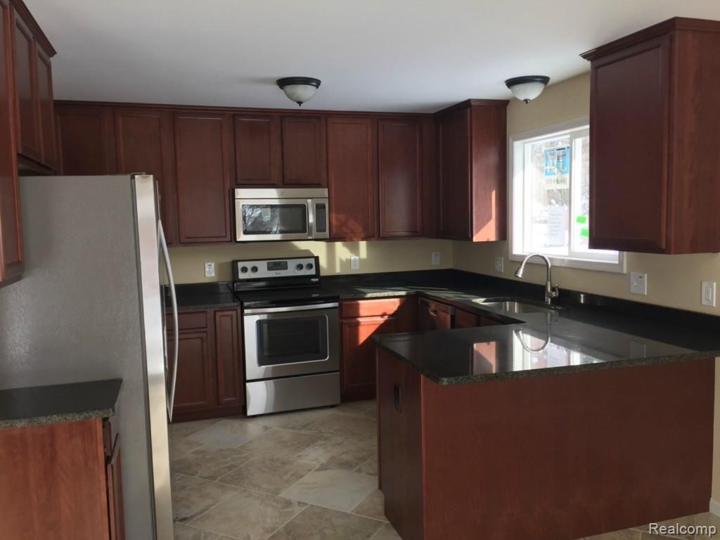 3084 Gerald Avenue Rochester, MI 48307 - Photo 19 of 47 Tall 42 inch upper cabinets offers lots of storage!
