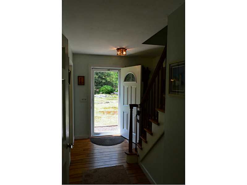 270 Biscuit City Road Charlestown, RI 02813 - Photo 9 of 25 Entry. 1 of 2 staircases in this home (this is the main staircase)