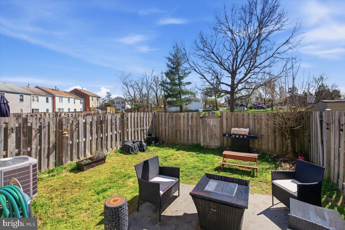 9551 Covington Place Manassas, VA 20109 - Photo 23 of 24 a view of a backyard with furniture