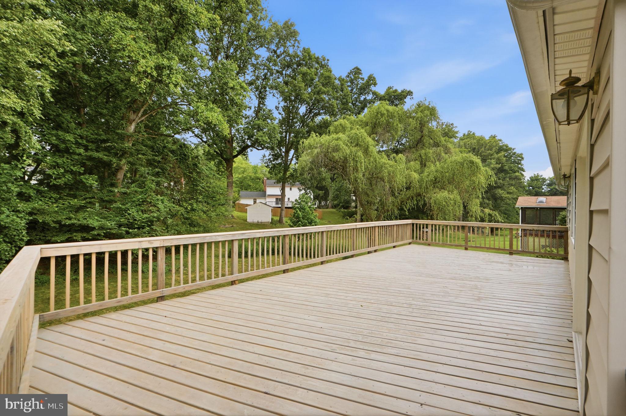 14204 Piccadilly Road Silver Spring, MD 20906 - Photo 11 of 42 Huge Deck overlooking private backyard