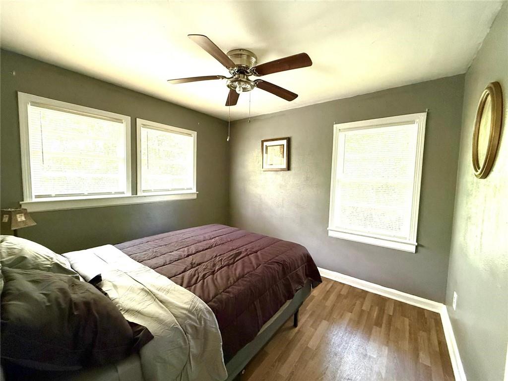 2602 Lakeridge Circle Northwest Rome, GA 30165 - Photo 13 of 18 a bedroom with a bed and window