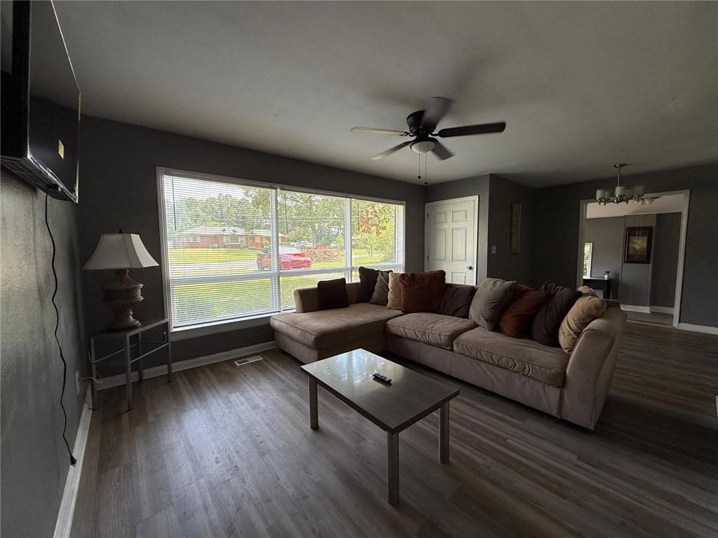 2602 Lakeridge Circle Northwest Rome, GA 30165 - Photo 4 of 18 a living room with furniture and a large window