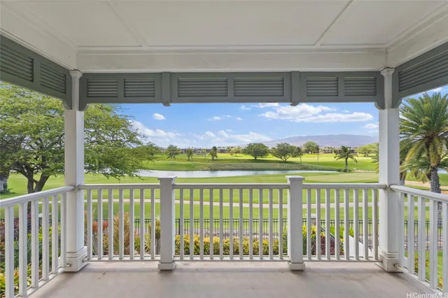 a view of a balcony with lake view