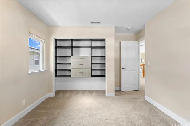 a bathroom with a sink double vanity granite tub and a mirror