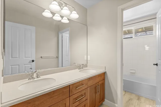 an empty room with wooden floor and closet