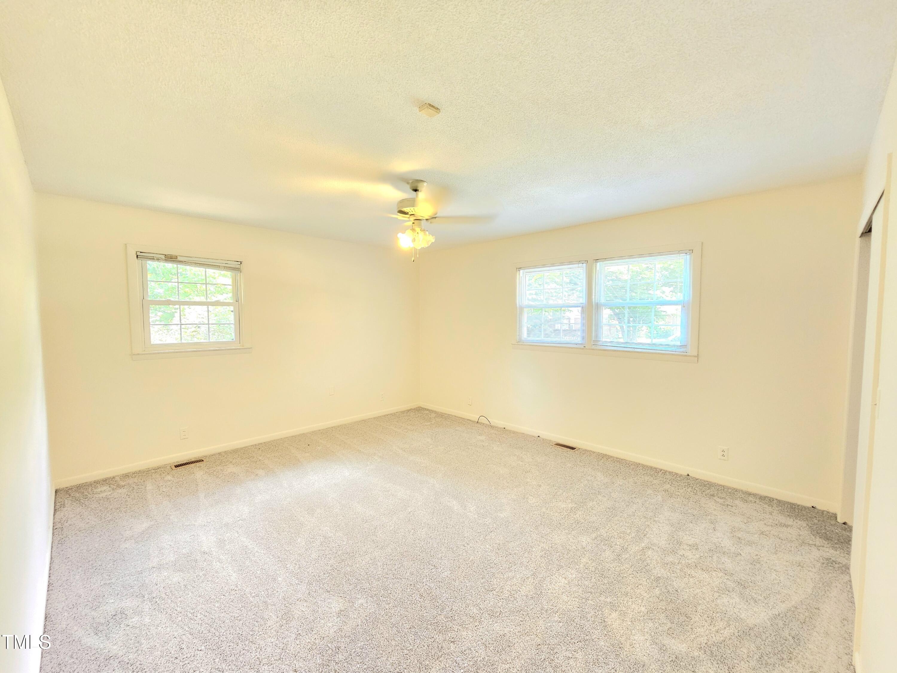 400 Harrill Circle Spring Lake, NC 28390 - Photo 16 of 25 an empty room with a window