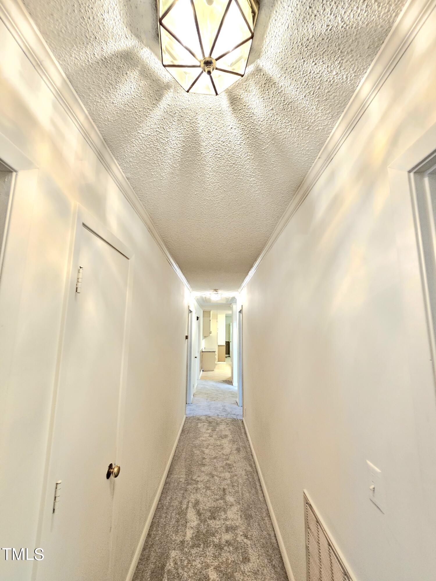 400 Harrill Circle Spring Lake, NC 28390 - Photo 20 of 25 a view of a hallway with a white walls