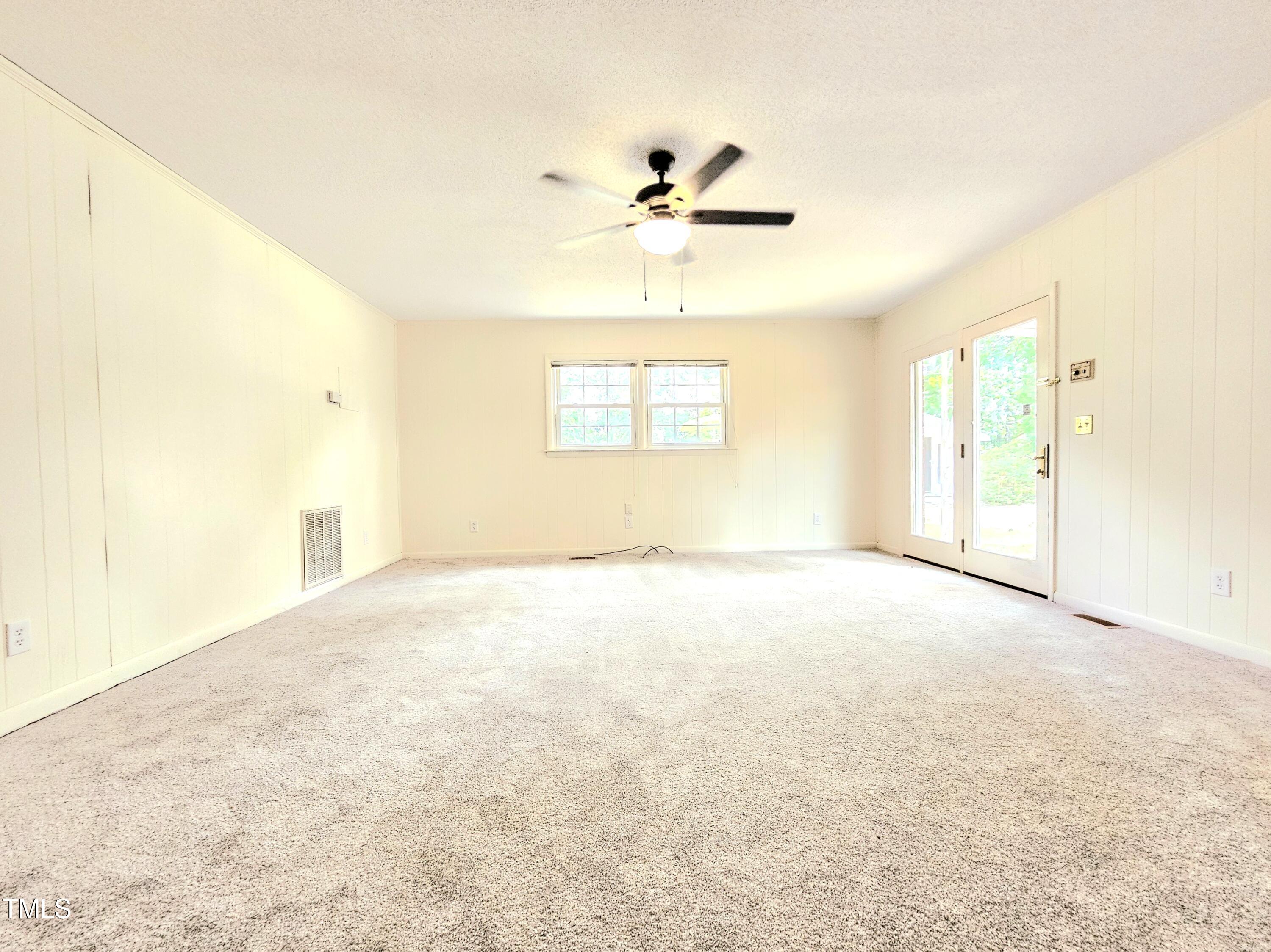 400 Harrill Circle Spring Lake, NC 28390 - Photo 23 of 25 a view of an empty room with a window