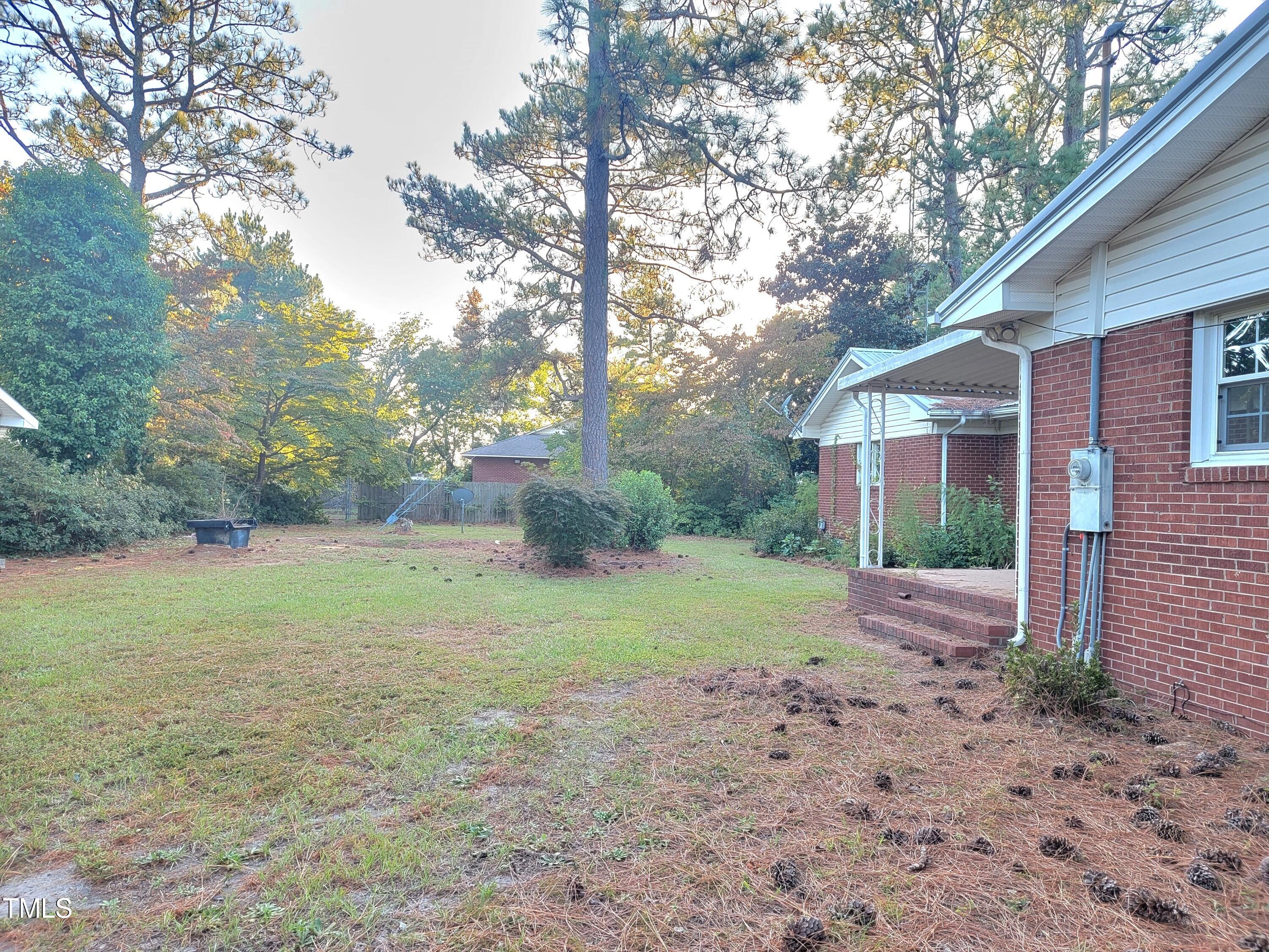 400 Harrill Circle Spring Lake, NC 28390 - Photo 24 of 25 a view of a yard with a tree