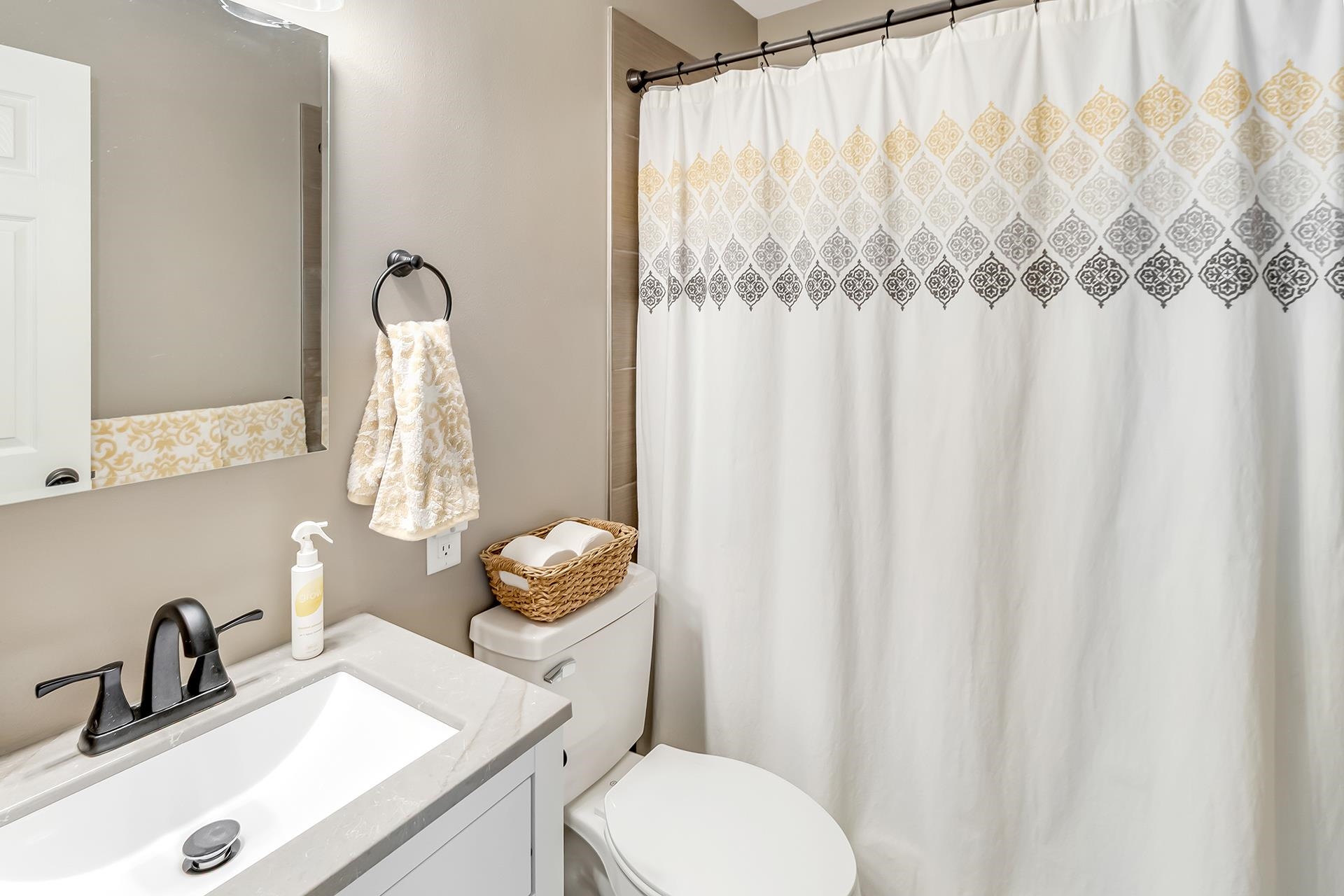 2118 Saguaro Road Grand Junction, CO 81507 - Photo 14 of 42 a bathroom with a sink mirror and a toilet