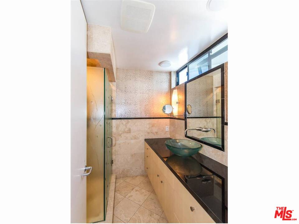 734 Esplanade, Unit A/B Redondo Beach, CA 90277 - Photo 16 of 40 a kitchen with sink and shower