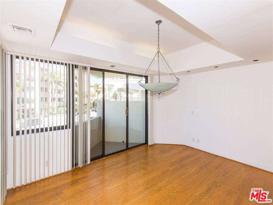 734 Esplanade, Unit A/B Redondo Beach, CA 90277 - Photo 23 of 40 a view of empty room with a ceiling fan and window