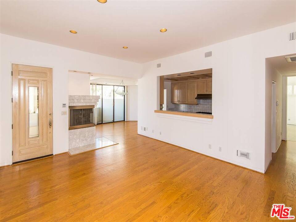 734 Esplanade, Unit A/B Redondo Beach, CA 90277 - Photo 24 of 40 a view of an empty room with glass door