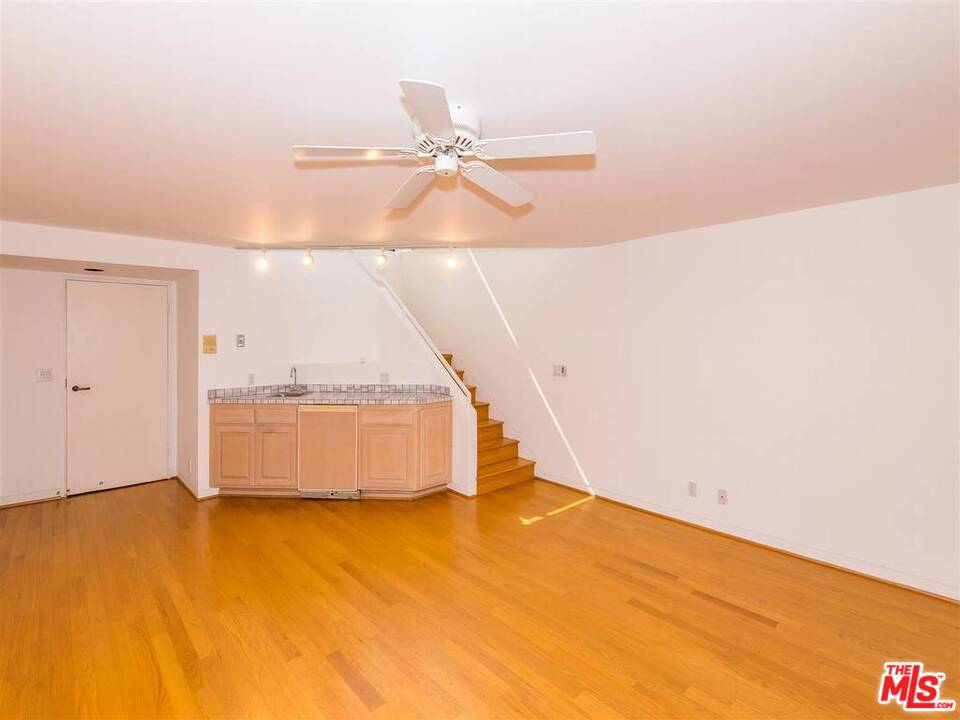 734 Esplanade, Unit A/B Redondo Beach, CA 90277 - Photo 30 of 40 a view of a room with racks on the wall