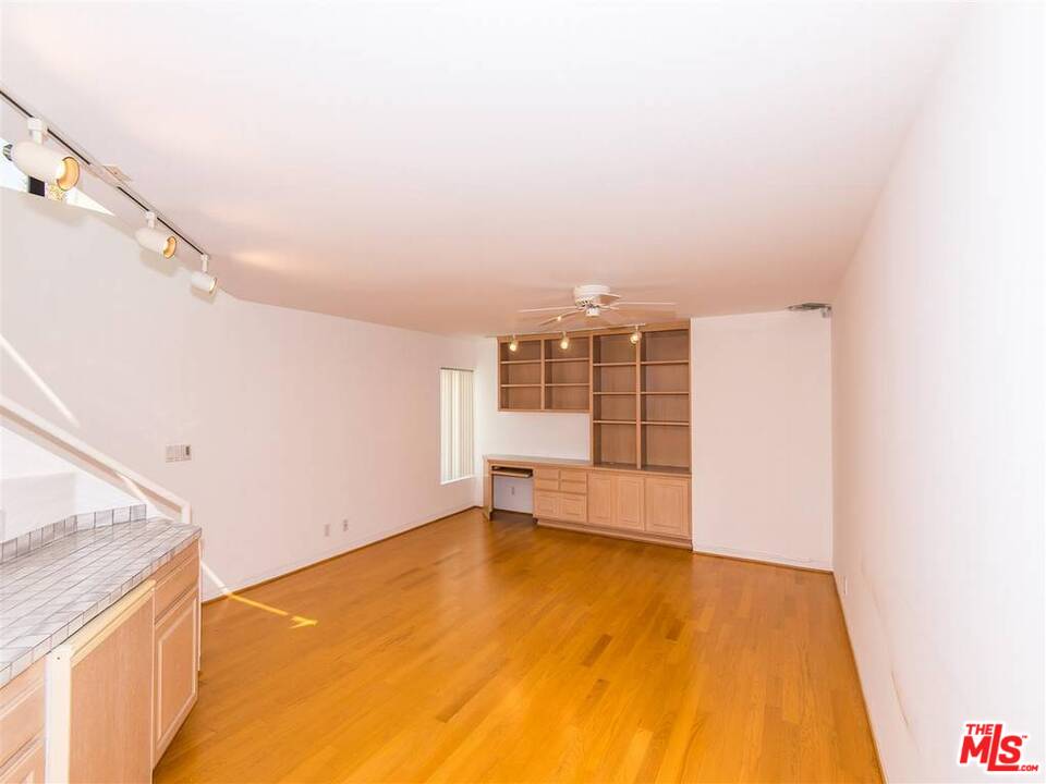 734 Esplanade, Unit A/B Redondo Beach, CA 90277 - Photo 31 of 40 a view of a room with rack and wooden floor