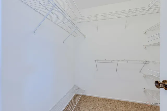 a view of a room with racks on the wall