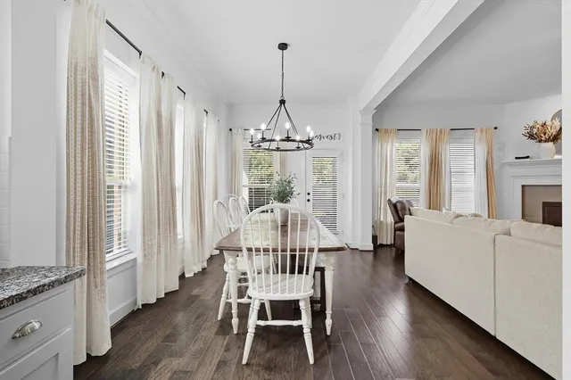 a spacious bedroom with a bed and window