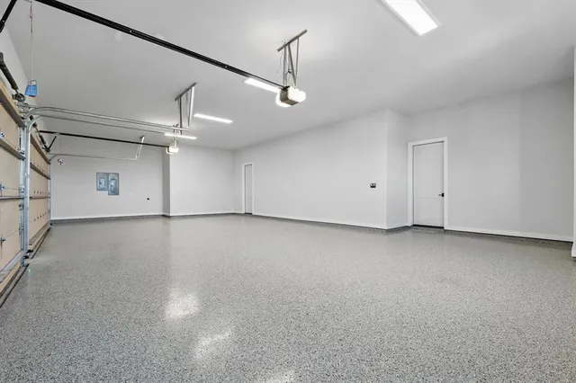 a view of a room with window and a ceiling fan