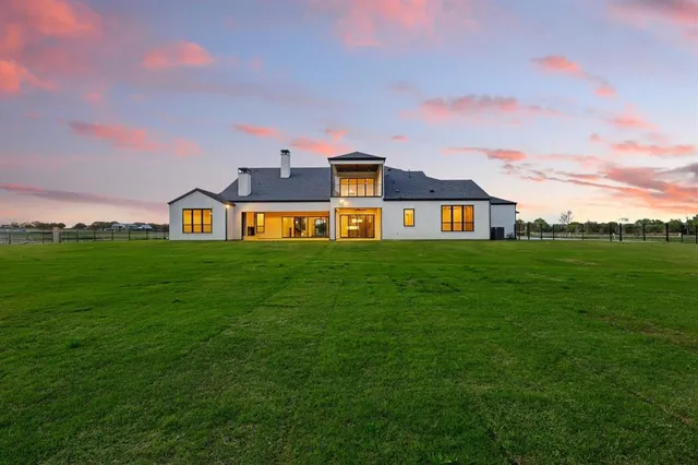 a city view with tall buildings and a yard