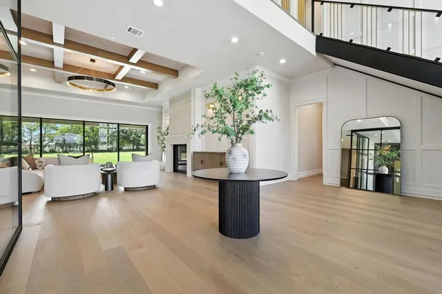 a view of kitchen with furniture and large windows
