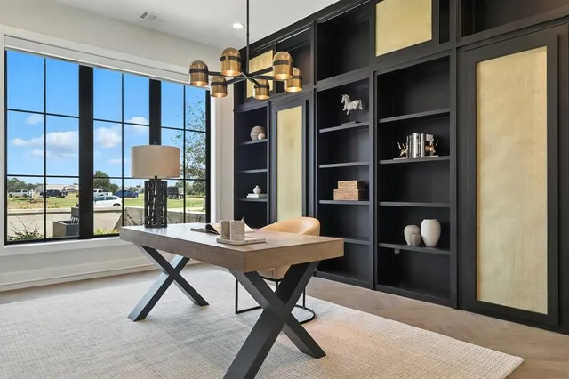 a view of a livingroom with furniture and window