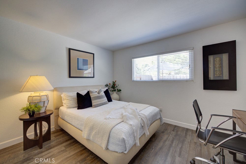 1715 Westfield Road Paso Robles, CA 93446 - Photo 17 of 25 a bedroom with a bed a desk and chair