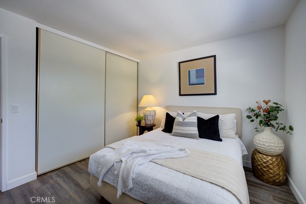 1715 Westfield Road Paso Robles, CA 93446 - Photo 18 of 25 a bedroom with a bed and a painting on the wall