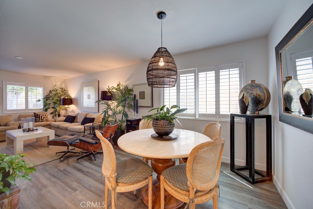 1715 Westfield Road Paso Robles, CA 93446 - Photo 6 of 25 a view of a dining room with furniture window and wooden floor