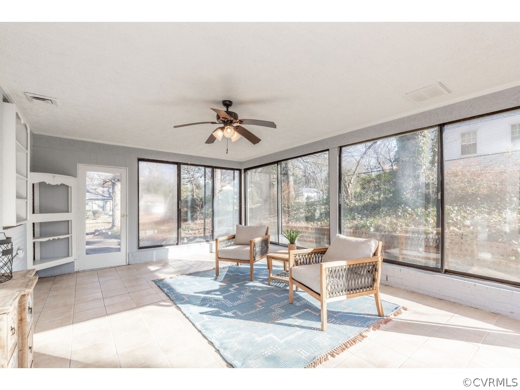 8541 Elm Road Richmond, VA 23235 - Photo 20 of 50 a living room with furniture and a large window
