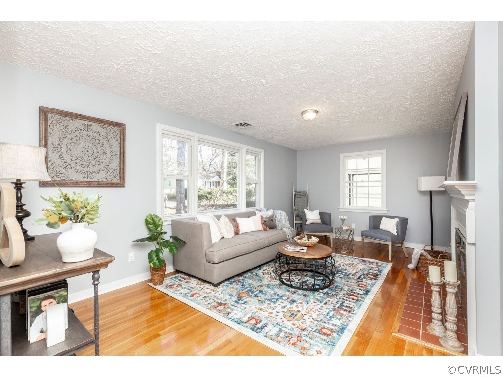 8541 Elm Road Richmond, VA 23235 - Photo 10 of 50 a living room with furniture rug and window
