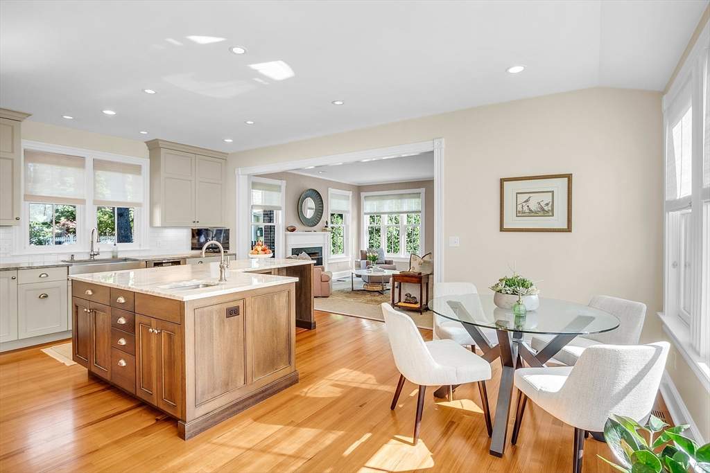 32 Lowell Road Concord, MA 01742 - Photo 10 of 42 a kitchen with a stove and a dining table
